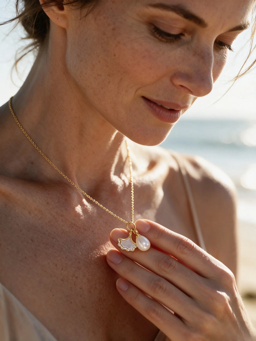 Natural Freshwater Pearl & Mother‑of‑Pearl Ginkgo Leaf Pendant Necklace, Sophisticated Zircon Accent Gold Plated Necklace for Women